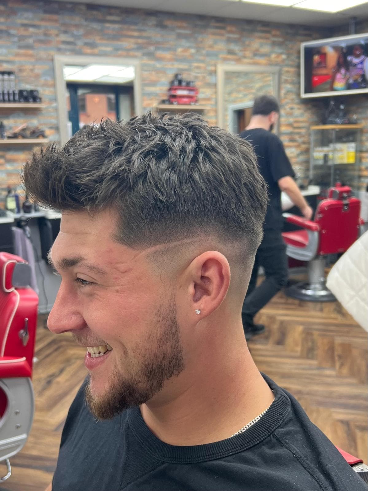 Pompadour style haircut